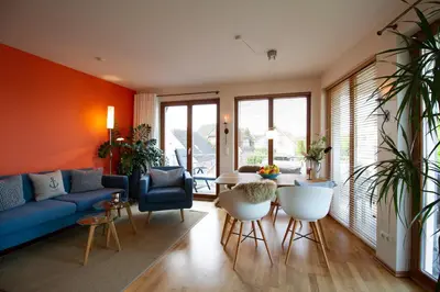 Ein Sitzbereich in der Unterkunft Küsten Lodge
