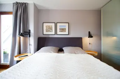Ein Bett oder Betten in einem Zimmer der Unterkunft Küsten Lodge