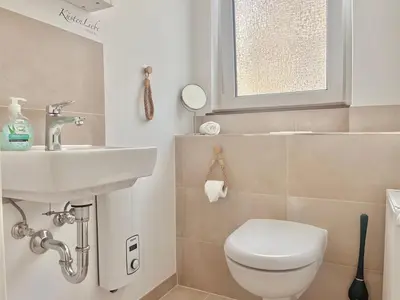 Ein Badezimmer in der Unterkunft Kuestenliebe von OstseeAhoi