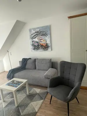 Ein Sitzbereich in der Unterkunft Ferienwohnung in Timmendorfer Strand, Niendorf an der Ostsee