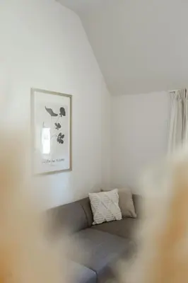 Ein Sitzbereich in der Unterkunft Reethus 22 Loft 2