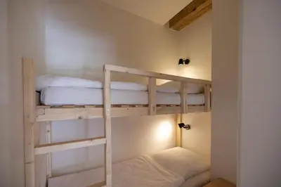 Ein Bett oder Betten in einem Zimmer der Unterkunft Reethus 22 Loft 4
