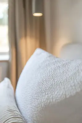 Ein Bett oder Betten in einem Zimmer der Unterkunft Reethus 22 Loft 5