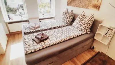 Ein Bett oder Betten in einem Zimmer der Unterkunft Ferienwohnung Mia
