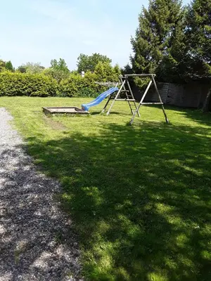 Ein Kinderspielbereich in der Unterkunft Ferienhaus Bolliger