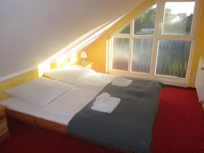 Ein Bett oder Betten in einem Zimmer der Unterkunft Ferienhaus Bolliger Apartment 3