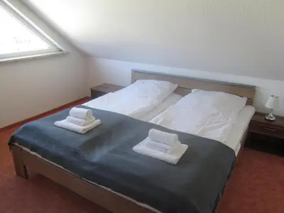 Ein Bett oder Betten in einem Zimmer der Unterkunft Ferienhaus Bolliger Apartment 3