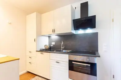 Küche/Küchenzeile in der Unterkunft Ferienwohnung Kleine Möwe Haffkrug