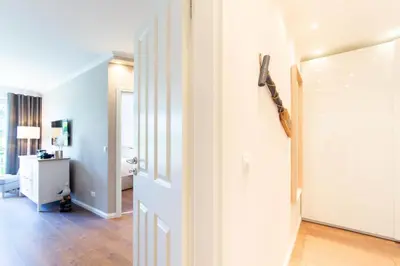 Ein Bett oder Betten in einem Zimmer der Unterkunft Ferienwohnung Kleine Möwe Haffkrug