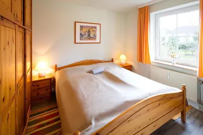 Ein Bett oder Betten in einem Zimmer der Unterkunft Fewo Hörn17/2 Scharbeutz