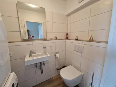 Ein Badezimmer in der Unterkunft Haus Aalweg Haffkrug
