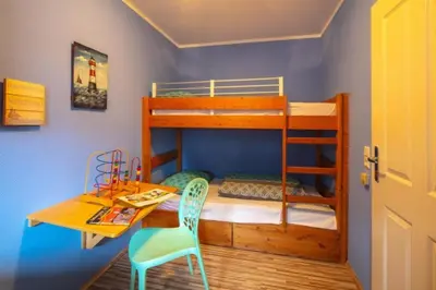Ein Bett oder Betten in einem Zimmer der Unterkunft Fewo Sorgenfrei Kammerweg 89 i Scharbeutz