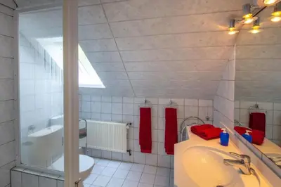 Ein Badezimmer in der Unterkunft Fewo Sonnensee Aalweg Haffkrug