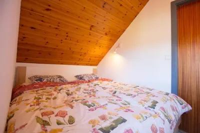 Ein Bett oder Betten in einem Zimmer der Unterkunft Fewo Knurrhahn 3/2 Haffkrug
