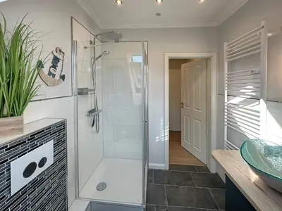 Ein Badezimmer in der Unterkunft Haus im Breitenkamp Little Suite Dream Haffkrug Appartement 6