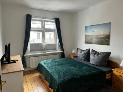 Ein Bett oder Betten in einem Zimmer der Unterkunft FEWO Relax