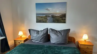 Ein Bett oder Betten in einem Zimmer der Unterkunft FEWO Relax