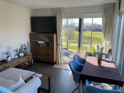 Ein Sitzbereich in der Unterkunft Beach House Chalet Seeparx Süsel