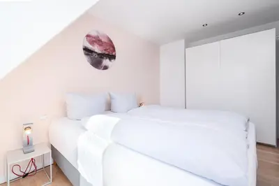 Ein Bett oder Betten in einem Zimmer der Unterkunft Ferienwohnung Casa Mulino