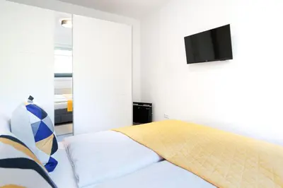 Ein Bett oder Betten in einem Zimmer der Unterkunft Ferienwohnung Klein & Fein