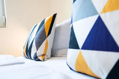 Ein Bett oder Betten in einem Zimmer der Unterkunft Ferienwohnung Klein & Fein