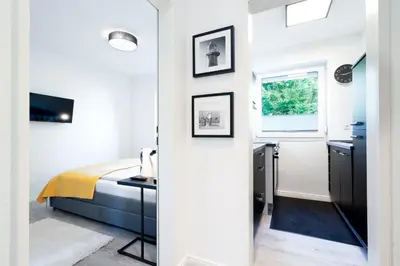 Ein Bett oder Betten in einem Zimmer der Unterkunft Ferienwohnung Klein & Fein