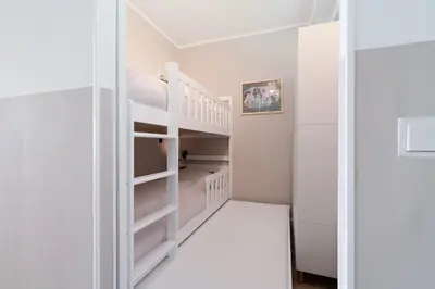 Ein Bett oder Betten in einem Zimmer der Unterkunft Ferienpark Sierksdorf App 185