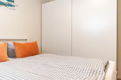 Ein Bett oder Betten in einem Zimmer der Unterkunft Ferienwohnung Sanddorn - Scharbeutz