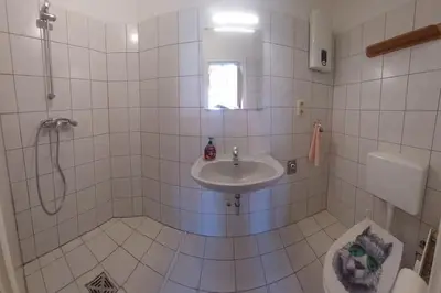 Ein Badezimmer in der Unterkunft Wo die Fledermaus fliegt, die zweite