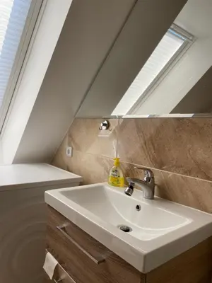 Ein Badezimmer in der Unterkunft Haus zum Strand Seestern