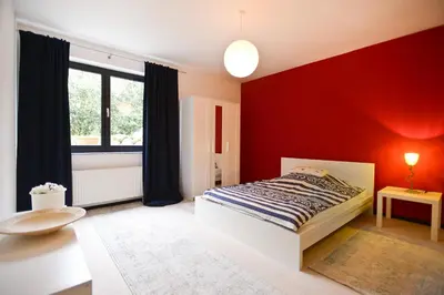 Ein Bett oder Betten in einem Zimmer der Unterkunft WOH15 Kapitänsresidenz