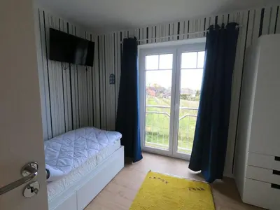 Ein Bett oder Betten in einem Zimmer der Unterkunft Seelust