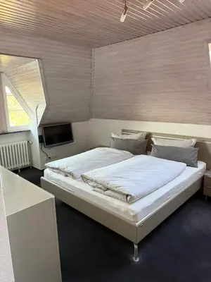 Ein Bett oder Betten in einem Zimmer der Unterkunft Urlaub im Erlenweg