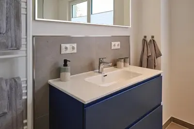 Ein Badezimmer in der Unterkunft Lykke Hus - Wohnung Mathildas Garten EG