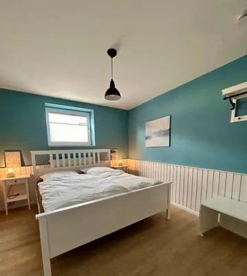 Ein Bett oder Betten in einem Zimmer der Unterkunft Smilla