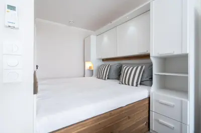 Ein Bett oder Betten in einem Zimmer der Unterkunft Ferienpark Sierksdorf App 501