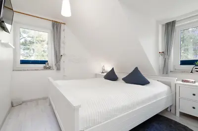 Ein Bett oder Betten in einem Zimmer der Unterkunft Gorch-Fock-Park App 32 Stranddüne
