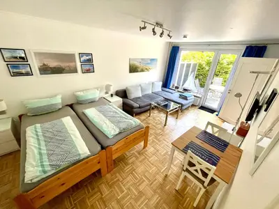 Ein Bett oder Betten in einem Zimmer der Unterkunft Ferienwohnung Bach in Travemünde