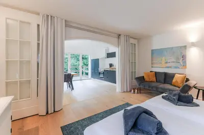 Ein Bett oder Betten in einem Zimmer der Unterkunft Haffperle - Strandgold