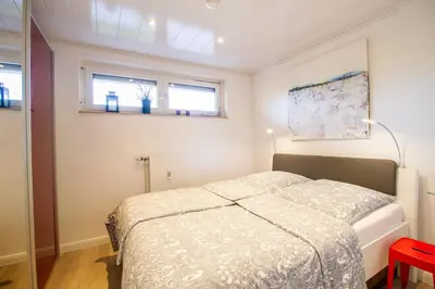 Ein Bett oder Betten in einem Zimmer der Unterkunft Beach House 21