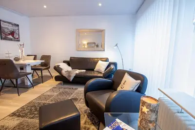 Ein Sitzbereich in der Unterkunft Beach House 21