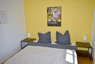 Ein Bett oder Betten in einem Zimmer der Unterkunft Exklusives Appartement Großzügig & topmodern