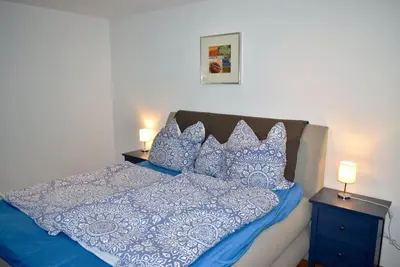 Ein Bett oder Betten in einem Zimmer der Unterkunft Exklusives Appartement Großzügig & topmodern