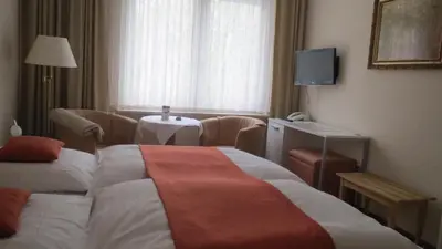 Ein Bett oder Betten in einem Zimmer der Unterkunft Pension Thiel