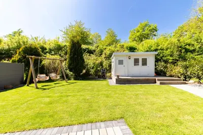 Ein Garten an der Unterkunft Ferienwohnung Neptuns Garden Haffkrug