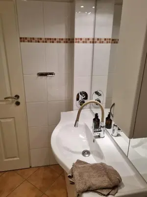 Ein Badezimmer in der Unterkunft Strandapartment May
