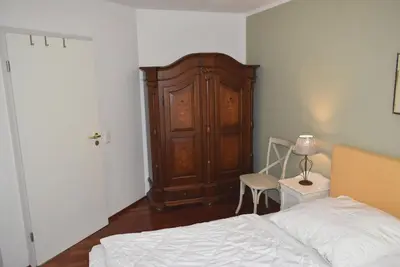 Ein Bett oder Betten in einem Zimmer der Unterkunft Ostseeallee 35 Ferienwohnung OstseeSchätzchen