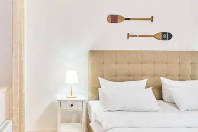 Ein Bett oder Betten in einem Zimmer der Unterkunft Residenz Johannsens Ap B12