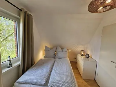 Ein Bett oder Betten in einem Zimmer der Unterkunft Raphael - 