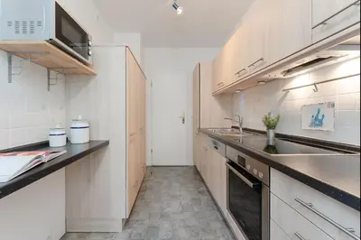 Küche/Küchenzeile in der Unterkunft Cozy Ankerplatz 61